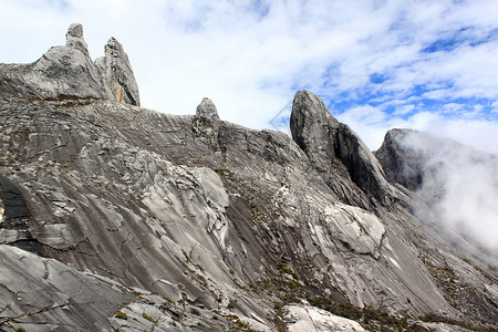 基纳巴卢马来西亚婆罗洲沙巴Kinaballu山顶的岩石背景