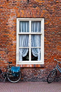 荷兰市有幕的窗口图片