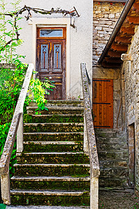 法式门素材法式住宅庭院的门廊和木门背景