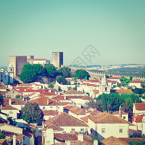 城堡窗口查看葡萄牙Obidos市历史中心Instagram效应背景