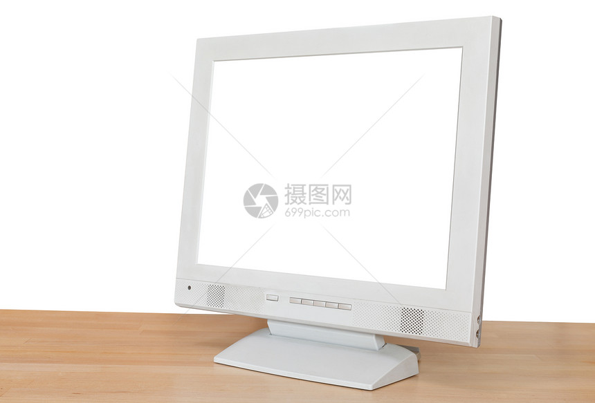 灰色计算机显示的侧视图在白色背景中孤立的木制表格上用剪切屏幕显示图片