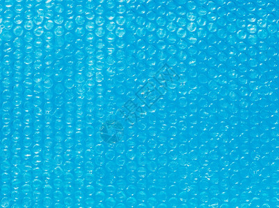 蓝水的泡包装胶片背景图片