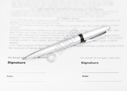 销售合同签字页上的银笔背景图片