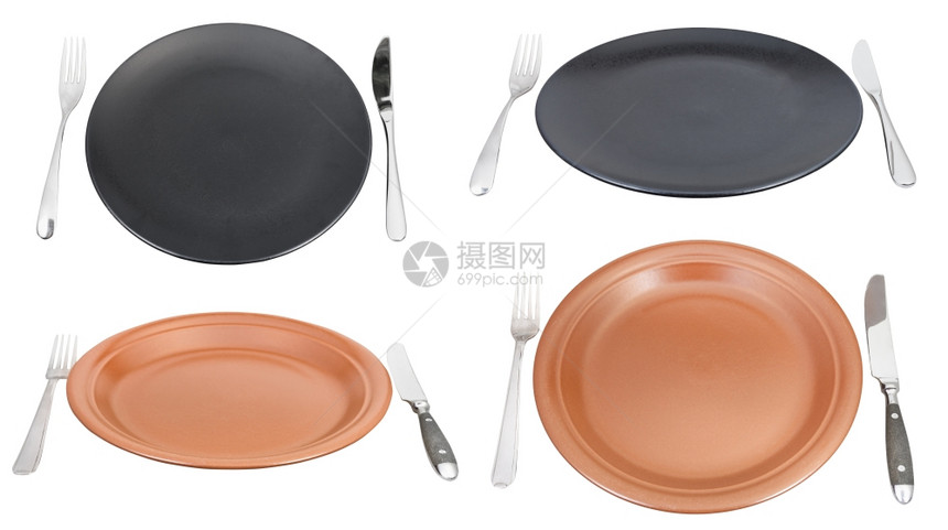一套空的餐盘上面有叉子和刀白色背景隔离在上图片