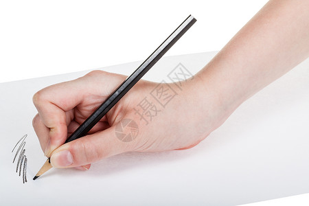 白色背景孤立的纸上木黑铅笔手工涂漆图片