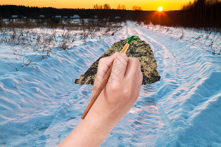 自然概念季节和天气变化季节和天气变化手用油漆刷画冬季雪路绿犁田图片