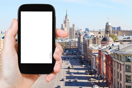 旅行概念手持智能机屏幕截断莫斯科街道背景图片