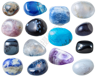 天然矿物宝石由15个蓝宝石和黑色制成这些是白底孤立的蓝宝石和黑图片