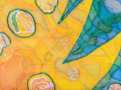 纺织背景在丝棒上涂有黄色和绿抽象手饰图片