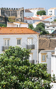 前往阿尔加韦葡萄牙参观塔维拉市居民住宅和城堡图片