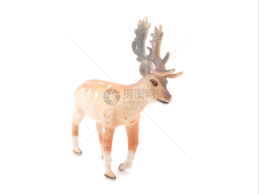 白色背景上的玩具鹿图片