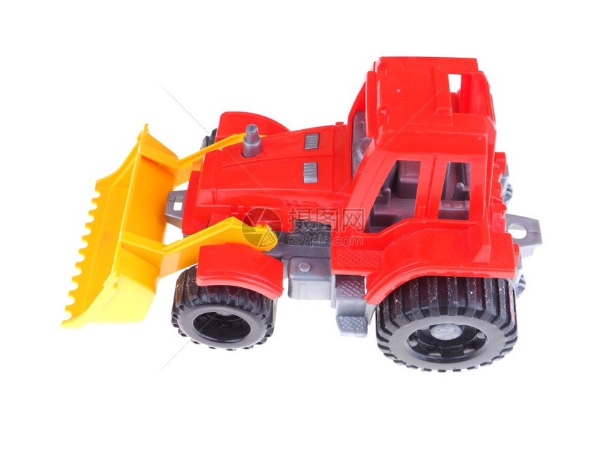 白色背景的红玩具拖拉机图片