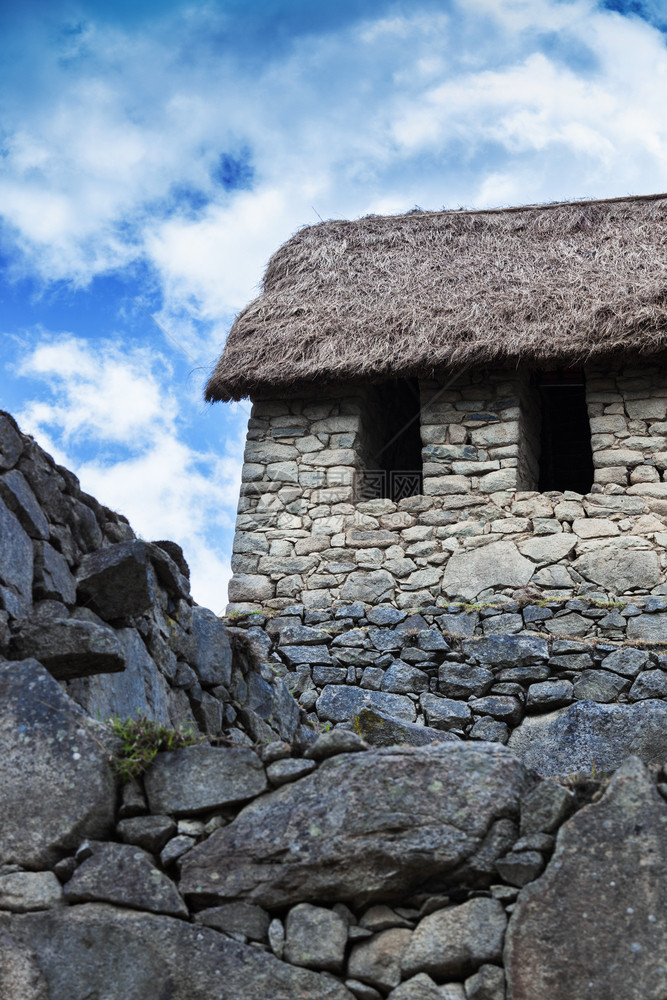 马丘皮古老的石墙和房屋图片
