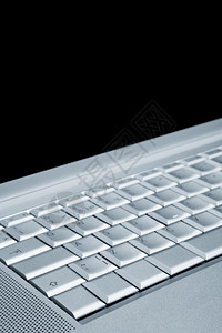 明亮的键盘现代和新式笔记本电脑背景图片