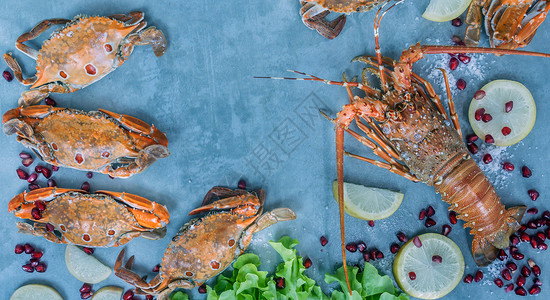 带有甲壳动物的食品框架龙虾螃蟹柠檬和本底石榴带有甲壳动物的食品框架图片