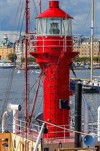 斯德哥尔摩港口的红船灯塔瑞典斯德哥尔摩船灯塔背景图片