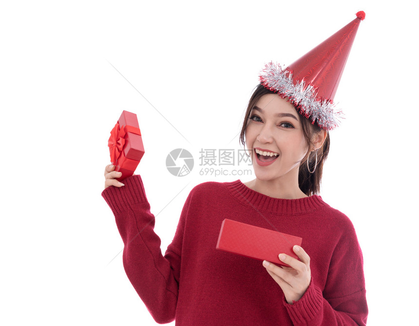 妇女打开白背景孤立的圣诞节礼物盒图片