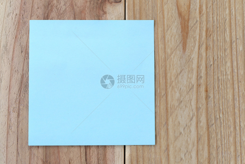 关于用设计和输入文字的旧棕色木材背景的蓝皮纸说明图片