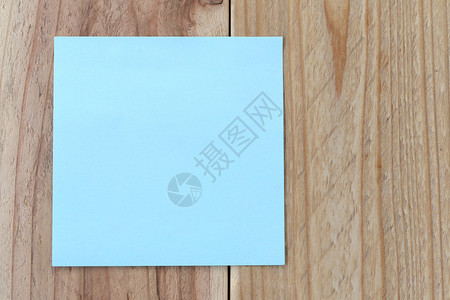关于用设计和输入文字的旧棕色木材背景的蓝皮纸说明图片