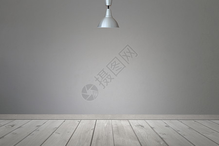 房间天花板灯光照向墙壁和地板面灰色水泥墙背景背景图片