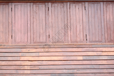 泰国一栋房子的旧木墙图片