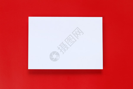 关于设计圣诞概念的红色艺术纸背景的空白皮书背景图片