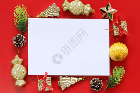 圣诞节装饰和关于设计工作概念的红色背景空白纸条背景图片