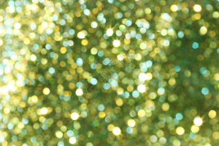 圣诞节的抽象金色和绿布基亚背景光色模糊设计您的工作新年概念图片
