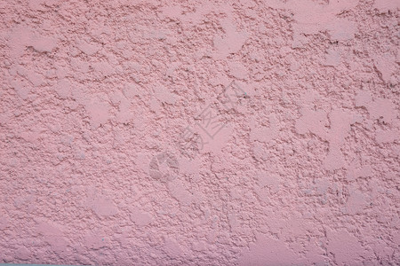 在你的工作背景概念中设计粉红色的肮脏水泥墙背景图片