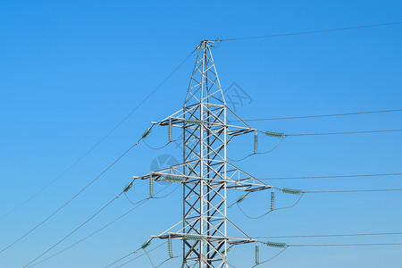 导电性支持对蓝色天空的高压电线支持对蓝色天空的高压电线背景