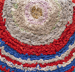 密闭的布毯上一块编织的地毯碎片图片