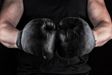 黑色拳击手套背景图片