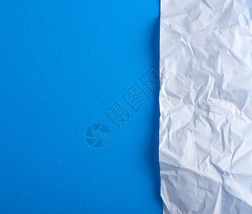 蓝背景复制空间的白纸背景图片