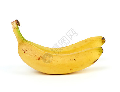 两个成熟的黄香蕉在白色背景的皮上关闭图片