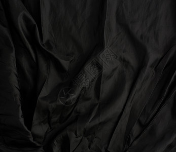 黑棉织物的纹理包括波浪全板缝纫衣物衬衫背景图片
