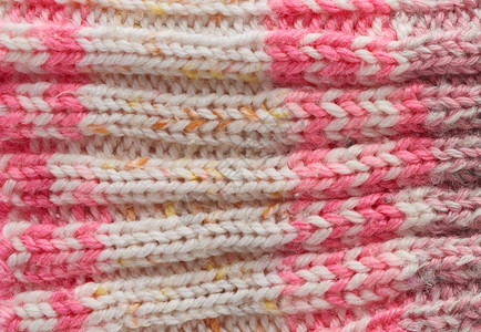 编织的粉红色纹身整温暖的羊毛衣缝合图片