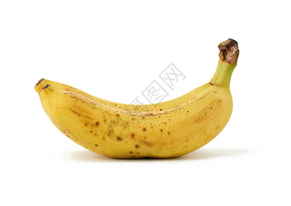 两只黄熟的香蕉被隔离在白色背景棕皮黄熟的水果上美味的高清图片素材