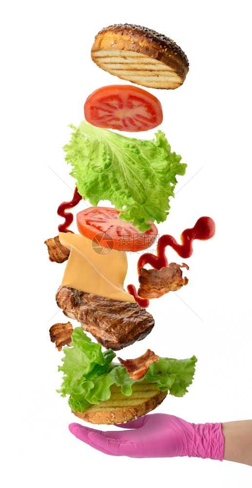 芝士汉堡麻面包炸牛排绿色沙拉和番茄切片图片