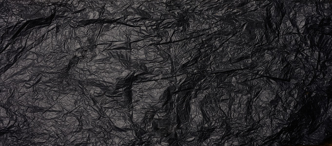 折叠黑纸抽象纹理背景横幅图片