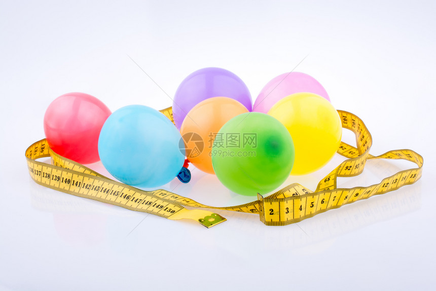 五颜六色的气球被卷尺环绕着背景是快乐的庆祝派对图片