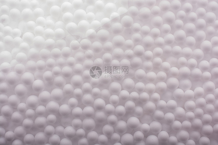 白色微聚苯乙烯泡沫球作为背景图片