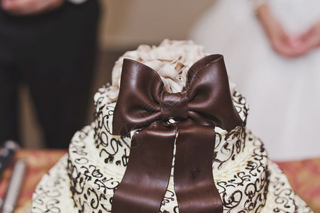棕色的蛋糕5267弓的婚礼蛋糕背景图片