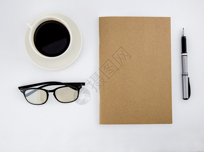 用笔记本咖啡杯顶视图的办公桌平面照片图片