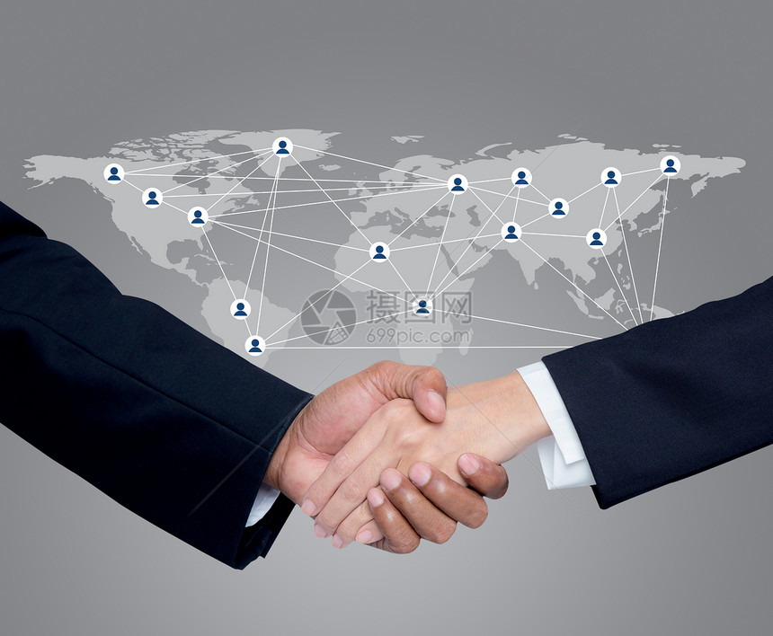 与全球通信网络背景的人握手企业图片