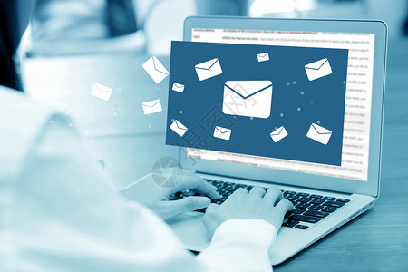 邮件发送利用电脑键盘以蓝调通讯概念发送电子邮件背景