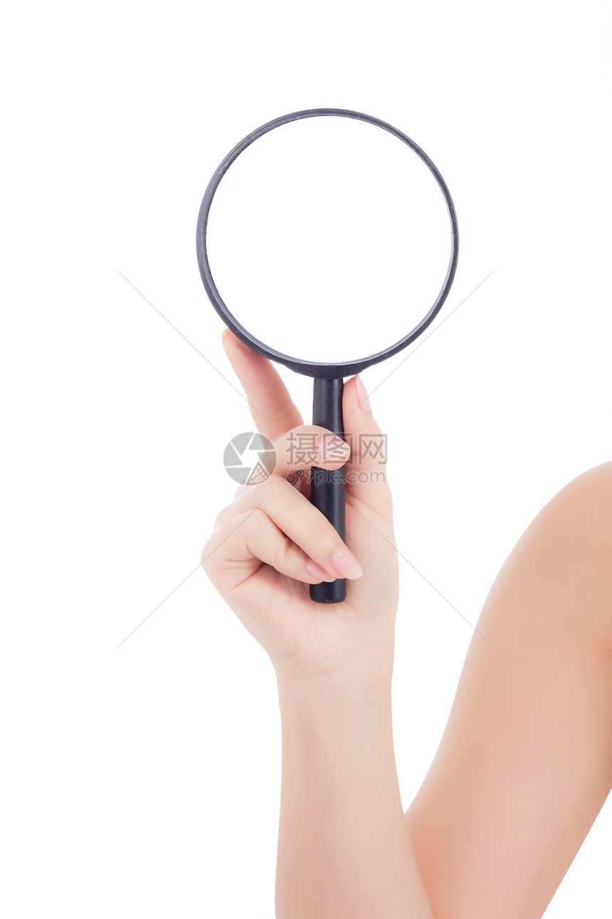 近身手握放大镜的女人与白色背景隔绝侦探和搜索分析视觉概念图片