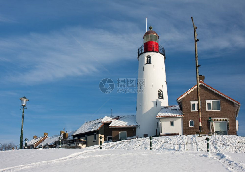 荷兰渔业村乌尔克冬季荷兰灯塔图片
