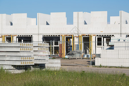 在建筑工地用砂石砖建造家庭房屋背景图片