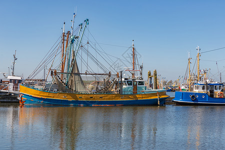 弗莱斯兰荷兰港的虾渔船Lauwersoog荷兰港的虾渔船Lauwersoog背景