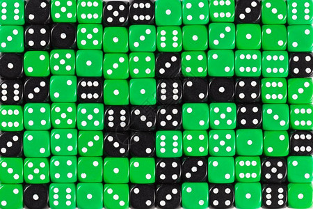 具有三分之二随机订购绿色骰子和三分之一黑色骰子的图案背景图片